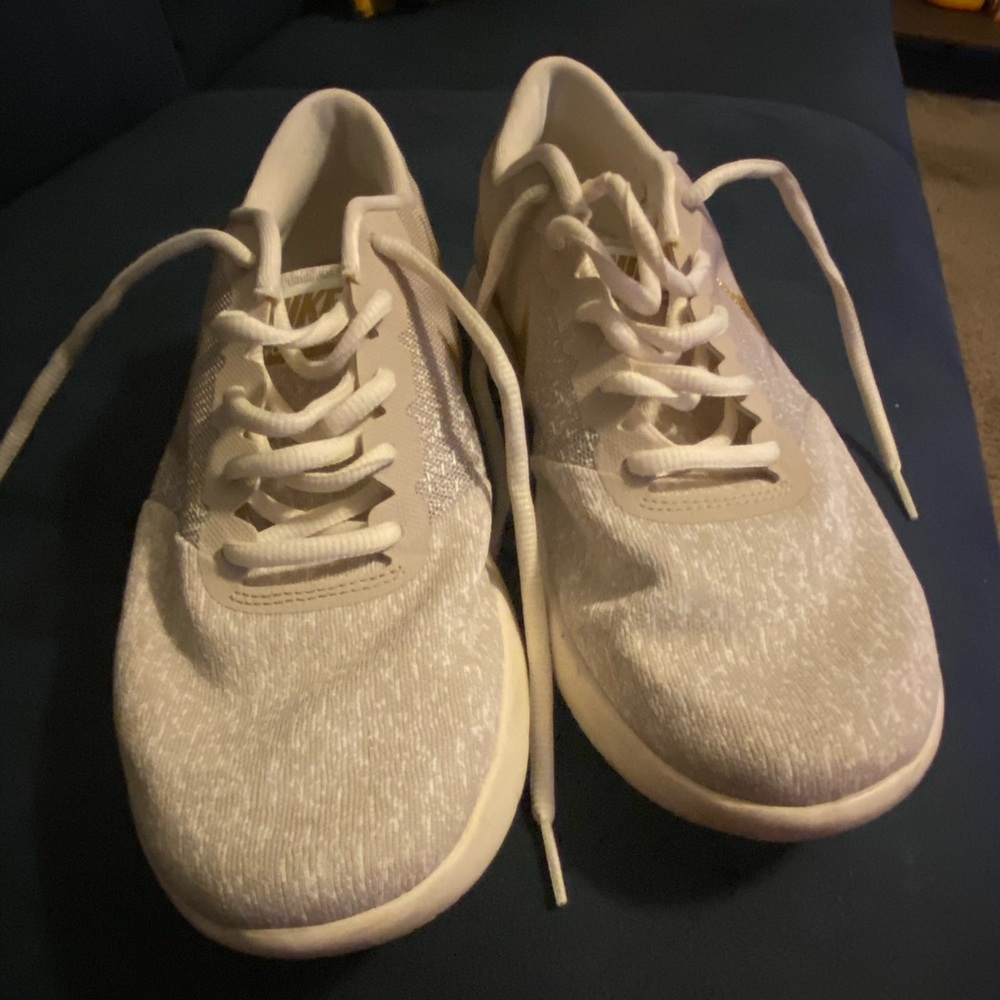 Cream and gold Nike sneakers size 10 in women